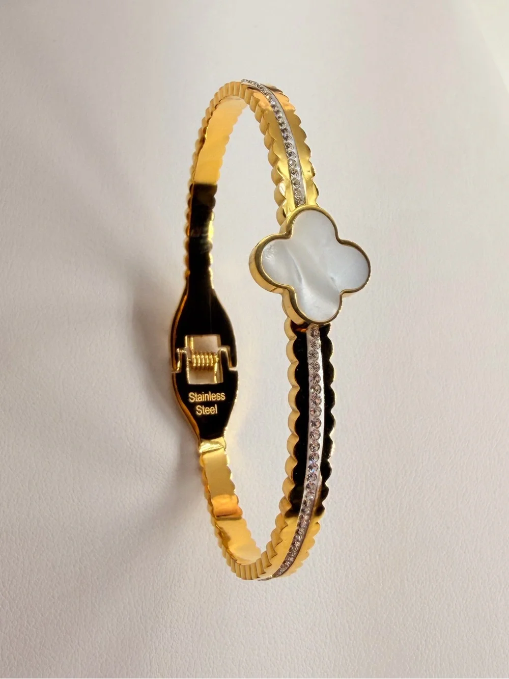 Stainless steel Gold Bangle Bracelet with White Mother-of-Pearl Clover Accent